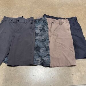 Set of Four Men's Shorts in Gray, Camo, and Tan